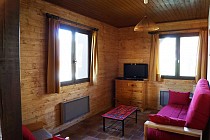 Chalet L'Arolle - 2-kamer apt. voor max. 4 pers. - woonkamer met koffietafel en tv